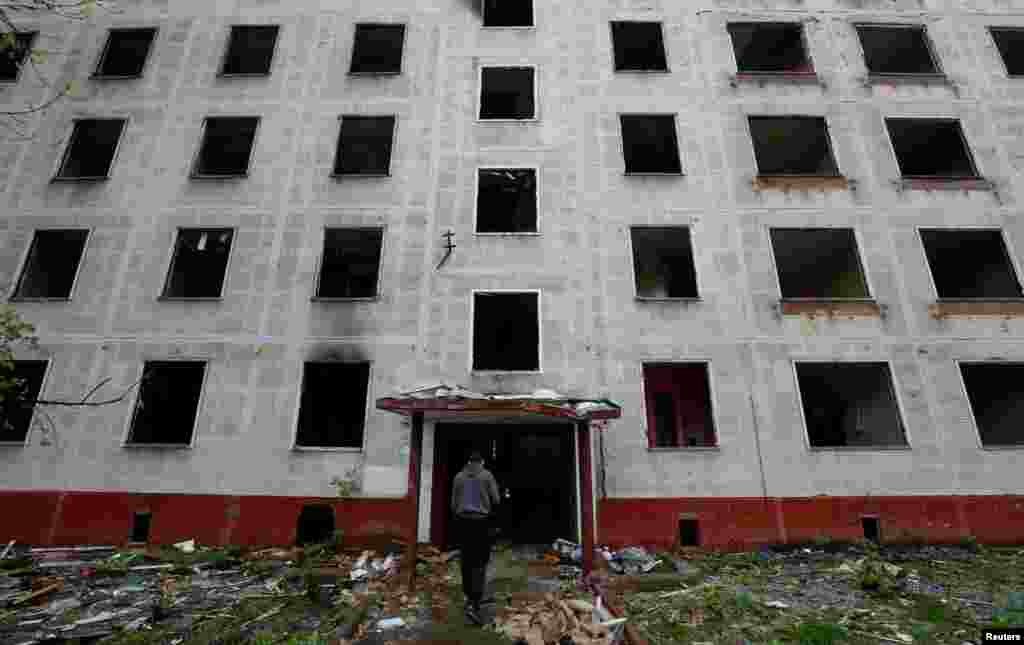 An emptied apartment block scheduled for demolition photographed on May 16. Looters are reportedly picking through some of the vacated apartments currently being knocked down.