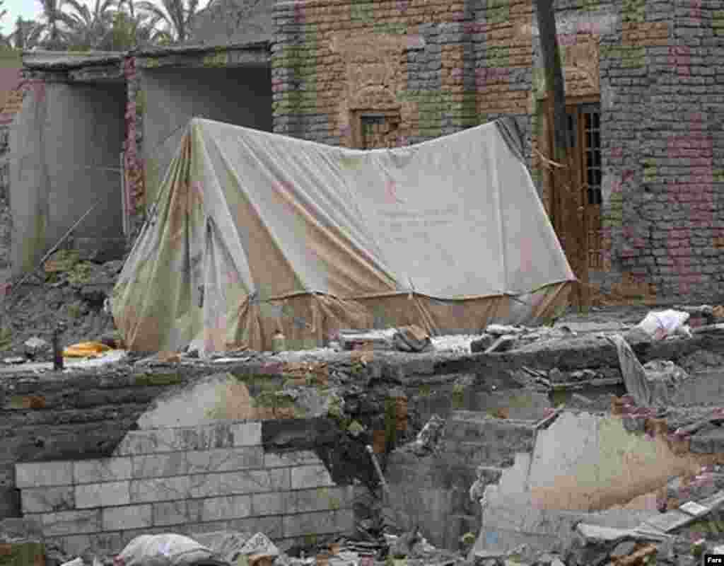 Three years after the earthquake, many in Bam continue to live in Red Crescent tents (Fars) - After the earthquake, the UN estimated that it would take at least two years to rebuild Bam, if the Iranian government took the lead and the international community provided needed aid. Today the reconstruction effort continues.