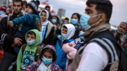 Беженцы в Греции.