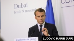 French President Emmanuel Macron gives a press conference in Dubai on November 9, 2017.