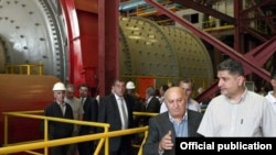 Armenia - Prime Minister Tigran Sarkisian (R) and Maxim Hakobian, CEO of the Zangezur Copper-Molybdenum Combine, visit the company's ore-processing plant in Syunik, 10Sept2011.