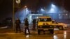 Police guard the entrance to the U.S. Embassy building in Podgorica, Montenegro, on February 22.