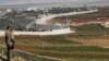 Lebanese soldiers/ Lebanese soldiers stand near the border with Israel, at the village of Kfar Kila, in south Lebanon December 5, 2018. 