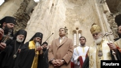 Georgian Patriarch Ilia II (right) blesses Mikheil Saakashvili (center) in the 11th-century Bagrati Cathedral after the latter's reelection as president in 2008. 