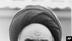 Ayatollah Ruhollah Khomeini, Iran's exiled religious leader, speaks on January 25, 1979, at a news conference following morning prayers in Paris. Through an interpreter, he told international journalists that he was postponing his return to Tehran because of the Iranian Army's closure of the airports.