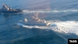 A photograph released by Russia's FSB security agency apparently showing an altercation between Russian and Ukrainian ships off the coast of Crimea on November 25. 