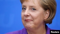 Канцлер Германии Ангела Меркель недовольна слишком дружественным отношением к Москве у немецкого руководства форума