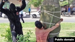 The Amnesty statement included an image used in Iranian news coverage of the incident, showing a young man tied to a tree as he was being flogged by a masked man. The rights watchdog said it could not independently verify whether it was a photo of the actual flogging in question.