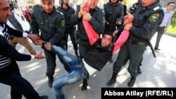On October 20, police rounded up dozens of protesters at an unsanctioned rally in central Baku, roughed them up, and forced them into police cars and buses, according to a Human Rights Watch report.