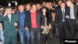 Armenia - Businessman Gagik Tsarukian (C) and former President Levon Ter-Petrosian lead an opposition demonstration in Yerevan, 24Oct2014.