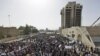 Many thousands took to the streets in the capital, Baghdad, to protest corruption and a lack of basic services.