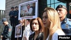 Armenia -- Supporters of arrested former parliament staffer Arsen Babayan protest outside a court building in Yerevan, October 24, 2019.