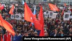 People attend a protest against the construction of a waste dump in Arkhangelsk, northwestern Russia on April 7.