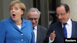 Angela Merkel i Fransoa Oland 