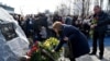 Relatives of Ukrainians who died in plane shot down by Iran attend ceremony unveiling memorial stone. February 17, 2020. 
