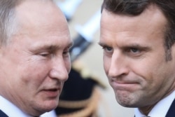 Владимир Путин и Эммануэль Макрон на переговорах в Париже, 9 декабря 2019 года