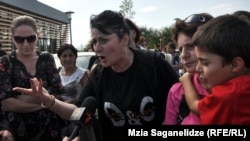 8-түрмедегі азаптау фактісіне қатысты наразылық танытушылар. Тбилиси, 19 қыркүйек 2012 жыл