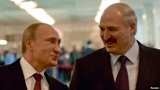 Президент Росії Володимир Путін (ліворуч) і президент Білорусі Олександр Лукашенко. Мінськ, 11 лютого 2015 року