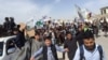حامیان احزاب جنبش و جمعیت در مزار شریف مظاهره کردند