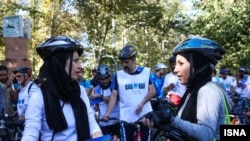 Iranian women on "Road without cars - Family cycling" initiative days. August 2016. File photo