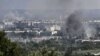 Smoke and dirt rise from the city of Syevyerodonetsk during fighting between Ukrainian and Russian troops on June 17.