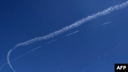 След самолета НАТО в небе над Адждабией
