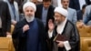 صادق لاریجانی (راست) رئیس سابق قوه قضائیه و حسن روحانی، رئیسجمهوری اسلامی ایران.