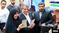 Mohsen Hashemi (center)