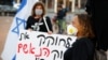 زنان اسرائیلی با پوشیدن ماسک در تظاهرات «پرچم سیاه» شرکت کردند تا به بنیامین نتانیاهو و «اقدامات ضد دمکراتیک» او اعتراض کنند.