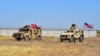 Maşini militare ale Turciei şi SUA în Siria de nord, lângă Tal Abyad. 24 septembrie 2019