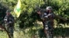 A Hezbollah fighter holds an Iranian-made anti-aircraft missile on the border with Israel, in Naqoura, April 20, 2017