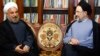 Iranian President-elect Hassan Rohani (left) meets with ex-President Mohammad Khatami at his home in Tehran in June 2013.