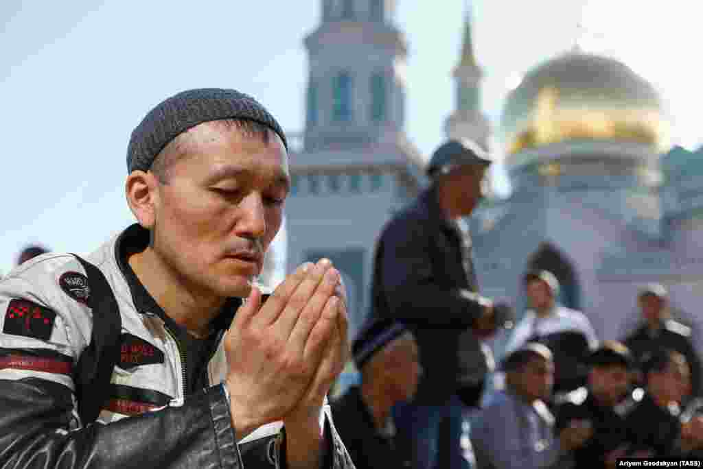 Muslims during celebrations on June 15 of Eid al-Fitr, a holiday that marks the end of Ramadan, outside the Moscow Cathedral Mosque. (TASS/Artyom Geodakyan)