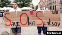 Activists in Krakow, Poland, on June 1 demand the release by Russia of Ukrainian prisoner Oleh Sentsov.