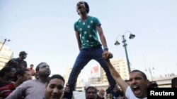 Supporters of the Muslim Brotherhood shout slogans against the military and Interior Ministry during a protest in front of the Al-Istkama Mosque on Giza Square, south of Cairo, on August 18.