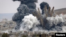 Huge explosions were seen in Kobani on November 17, the apparent result of U.S.-led air strikes targeting IS militants in the town.