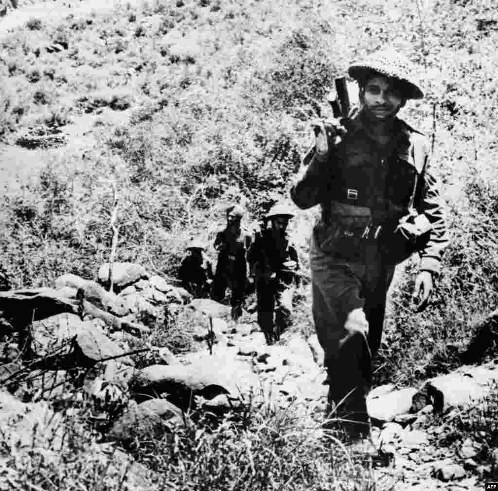 Indian troops patrolling the Kashmiri mountains in 1965. Pakistan and India have fought three wars over Kashmir, most recently in 1999.