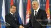 Serbian President Boris Tadic (R) with his Russian counterpart Dmitry Medvedev in Belgrade