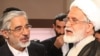 Iran -former Iran's presidential election candidates Mehdi Karoubi (R) and Mirhossein Mousavi speak . UNDATED