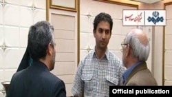 Video from Iranian TV shows Reza Dehbashi Kivi after his return from Australia.