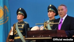 President Nursultan Nazarbaev's (right) linguistic skills had better be up to par ahead of elections in April. 