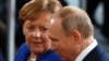 Angela Merkel və Vladimir Putin , arxiv foto