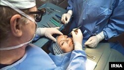 Cosmetic surgeries such as rhinoplasty and tummy tucks are extremely popular in Iran. FILE PHOTO.