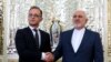 Iranian Foreign Minister Mohammad Javad Zarif (R) receives his German counterpart Heiko Maas in the capital Tehran, June 10, 2019