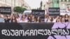 Women rights defenders march against violence in Tbilisi on July 19.