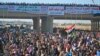 Iraqi protesters pray during a demonstration in Ramadi, capital of the western region of Anbar, on December 28.