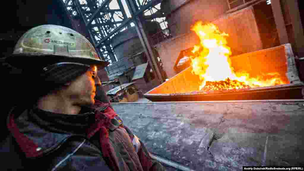 A car loaded with flaming sintered coke departs from the furnace for cooling. When the conflict erupted in eastern Ukraine in 2014, the Avdiyivka plant lost its main coal supply after Russia-backed separatist took control of three Metinvest mines near the Russian border. By 2017, output fell to 5,000 tons of coke per day due to a lack of coal and electricity. The plant was forced to find new suppliers and began receiving coal from American and Australian companies later that same year. &nbsp;