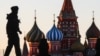 RUSSIA -- Police officers patrols on deserted Red Square after the city authorities announced a lockdown ordering residents to stay at home to prevent the spread of coronavirus disease, in central Moscow, April 6, 2020