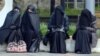 Veiled women take part in a rally of supporters of the Salafist movement in Pforzheim, Germany, in 2014.