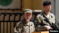 Incoming Commander of Resolute Support forces and command of NATO forces in Afghanistan, U.S. Army General Scott Miller speaks during a change of command ceremony in Resolute Support headquarters in Kabul on September 2.